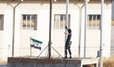 Tel Abyad'da SMO bayrağı göndere çekildi